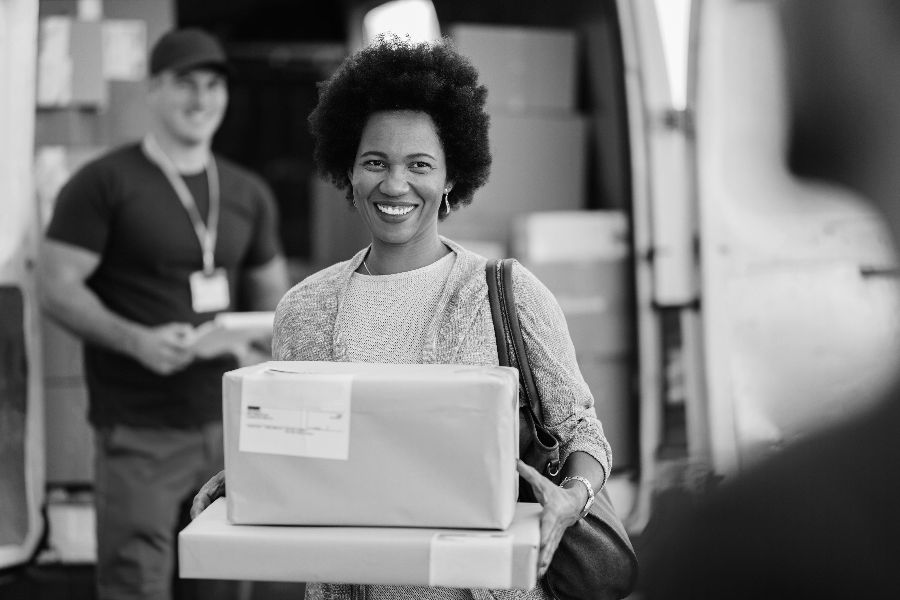 Woman Feeling Satisfied While Receiving Delivery Package